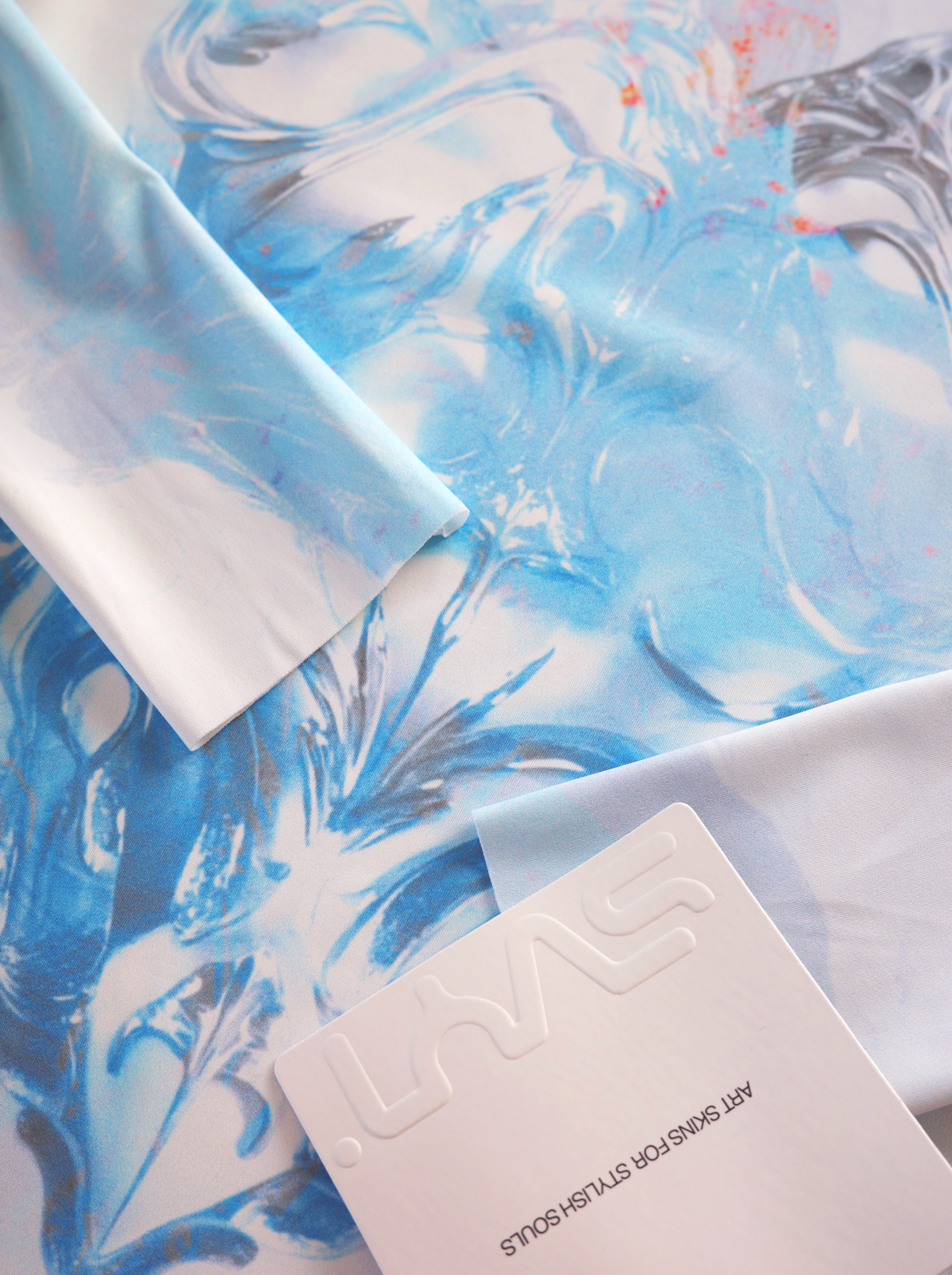 Product packaging with a blue and white marbled background